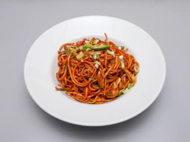 Chicken chow mein noodles with spring onion in a white bowl at Taste of Himalayan, Rowley Regis