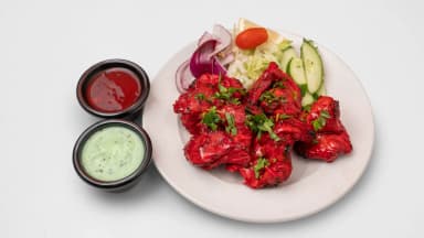 Chicken tikka pieces with salad, mint sauce and chilli sauce at Taste of Himalayan, Rowley Regis
