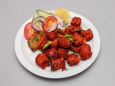 Soya chicken tikka pieces with salad and lemon at Taste of Himalayan, Rowley Regis