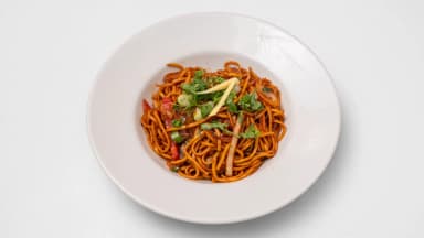 Vegetable chow mein noodles in a white bowl at Taste of Himalayan, Rowley Regis
